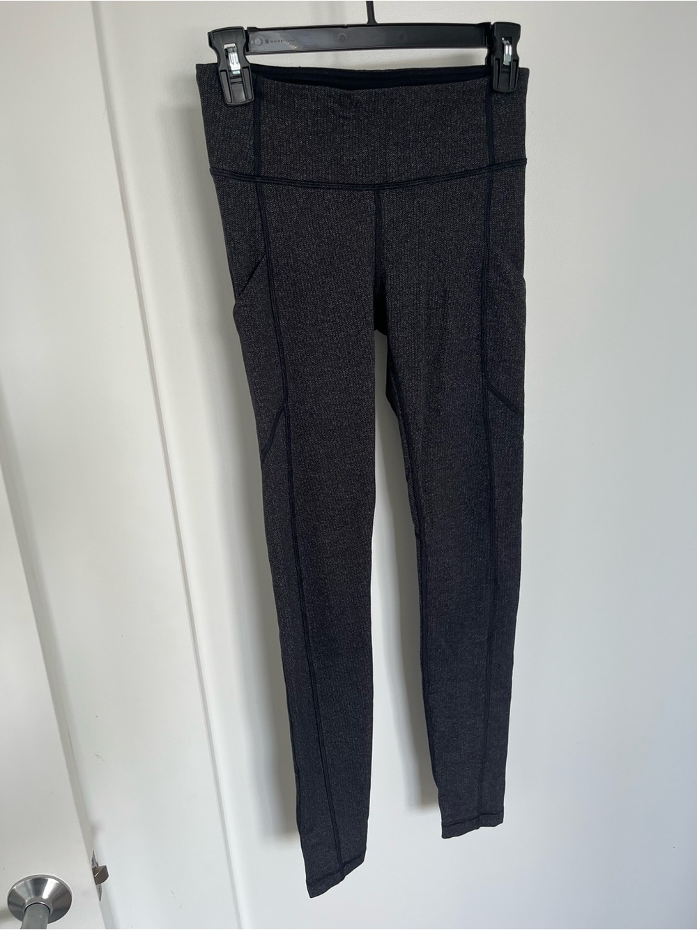 Lululemon Speed Up Tight in Heathered Black with Side Pockets